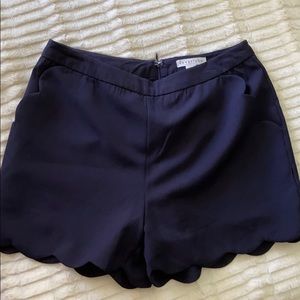 Dress shorts with scalloped detail